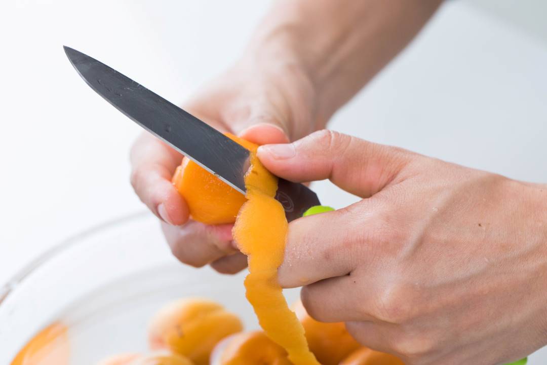 Peel the apricots.