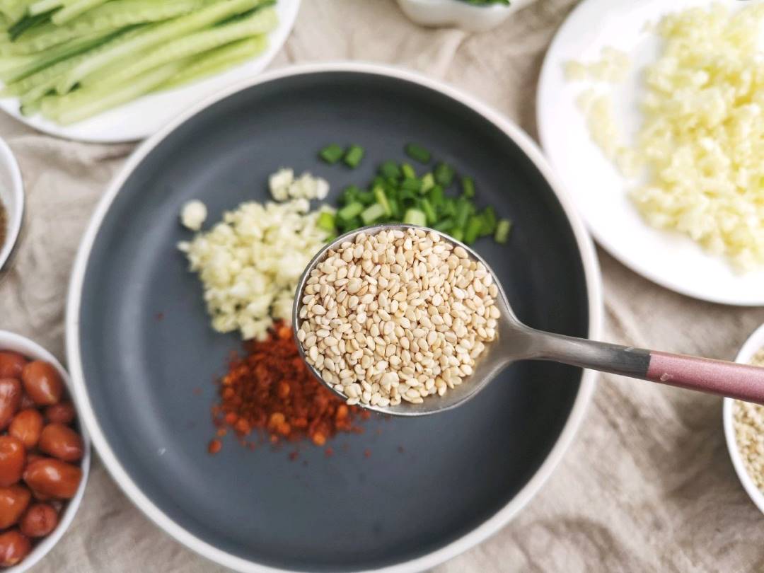 A spoonful of sesame seeds.