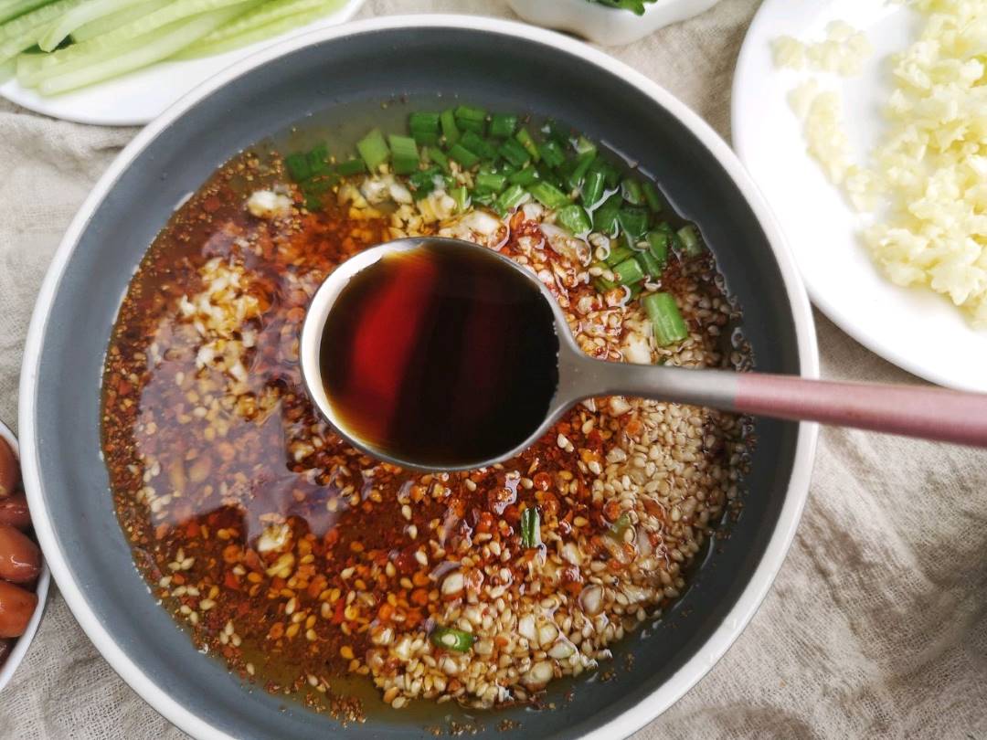 Stir well and add a spoonful of thin soy sauce