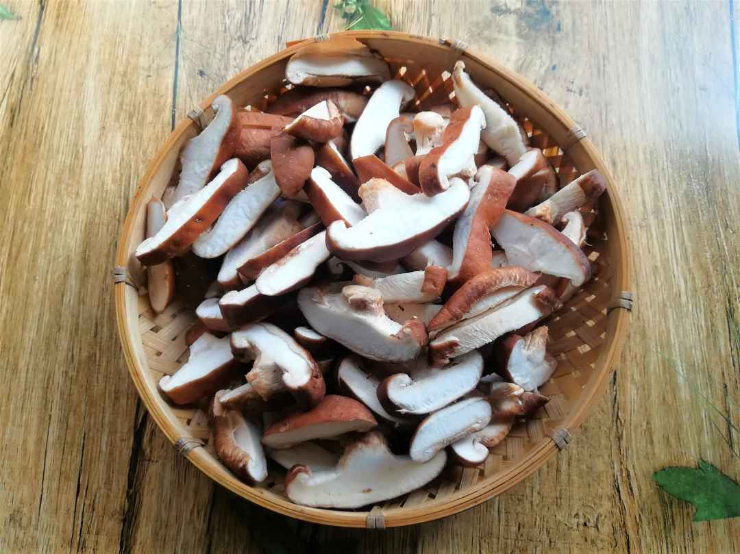 Slice the shiitake mushrooms